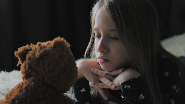 videoblocks-sad-depressed-girl-with-teddy-bear-punishment-childhood-education-problem-sad-little-girl-and-her-teddy-bear-sad-little-girl-feels-lonely_svd6en_zu_thumbnail-360_01