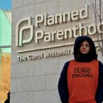 A_clinic_escort_outside_the_Planned_Parenthood_-_Carol_Whitehill_Moses_Center_(38949360565)