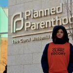 A_clinic_escort_outside_the_Planned_Parenthood_-_Carol_Whitehill_Moses_Center_(38949360565)