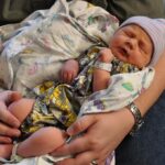The_newborn_baby_in_men