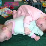 1280px-Being_a_twin_means_you_always_have_a_pillow_or_blanket_handy